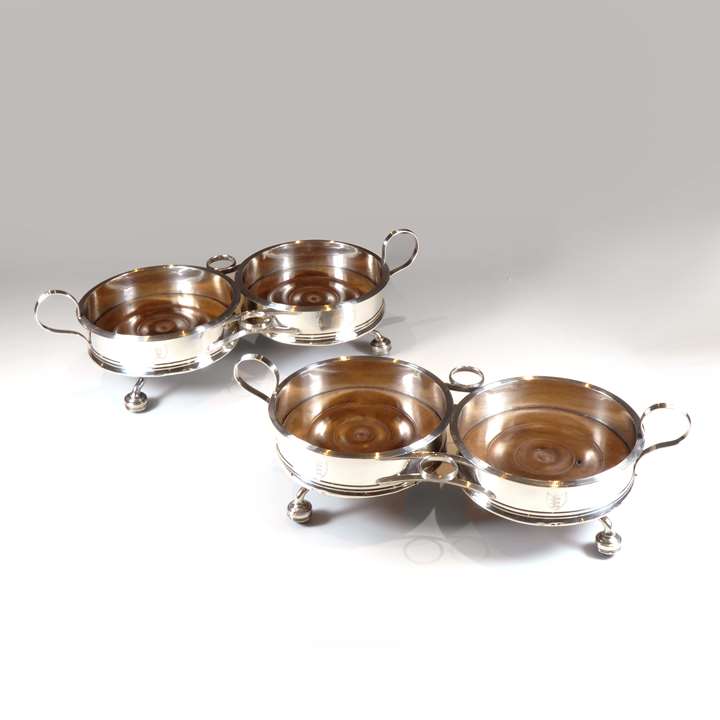 Pair of George III silver twin trolley coasters